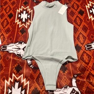 a new day women’s mint green bodysuit